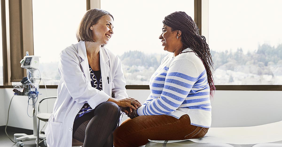 Doctor talking to patient