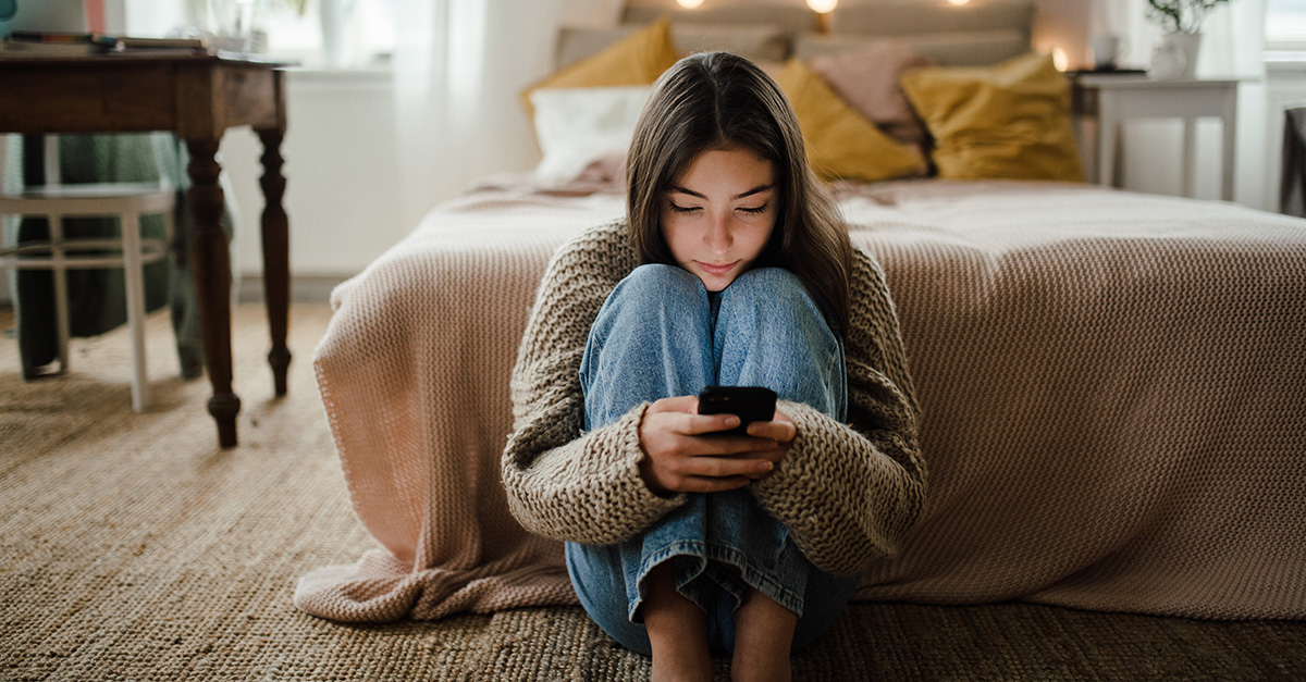 Teenage girl on her cell-phone